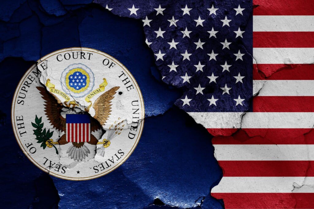 Supreme Court seal on left, U.S. flag on right, both on a textured background, symbolizing justice—a value upheld by any skilled Los Angeles employment attorney. Business & Commercial Law