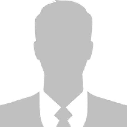 a man in a suit and tie